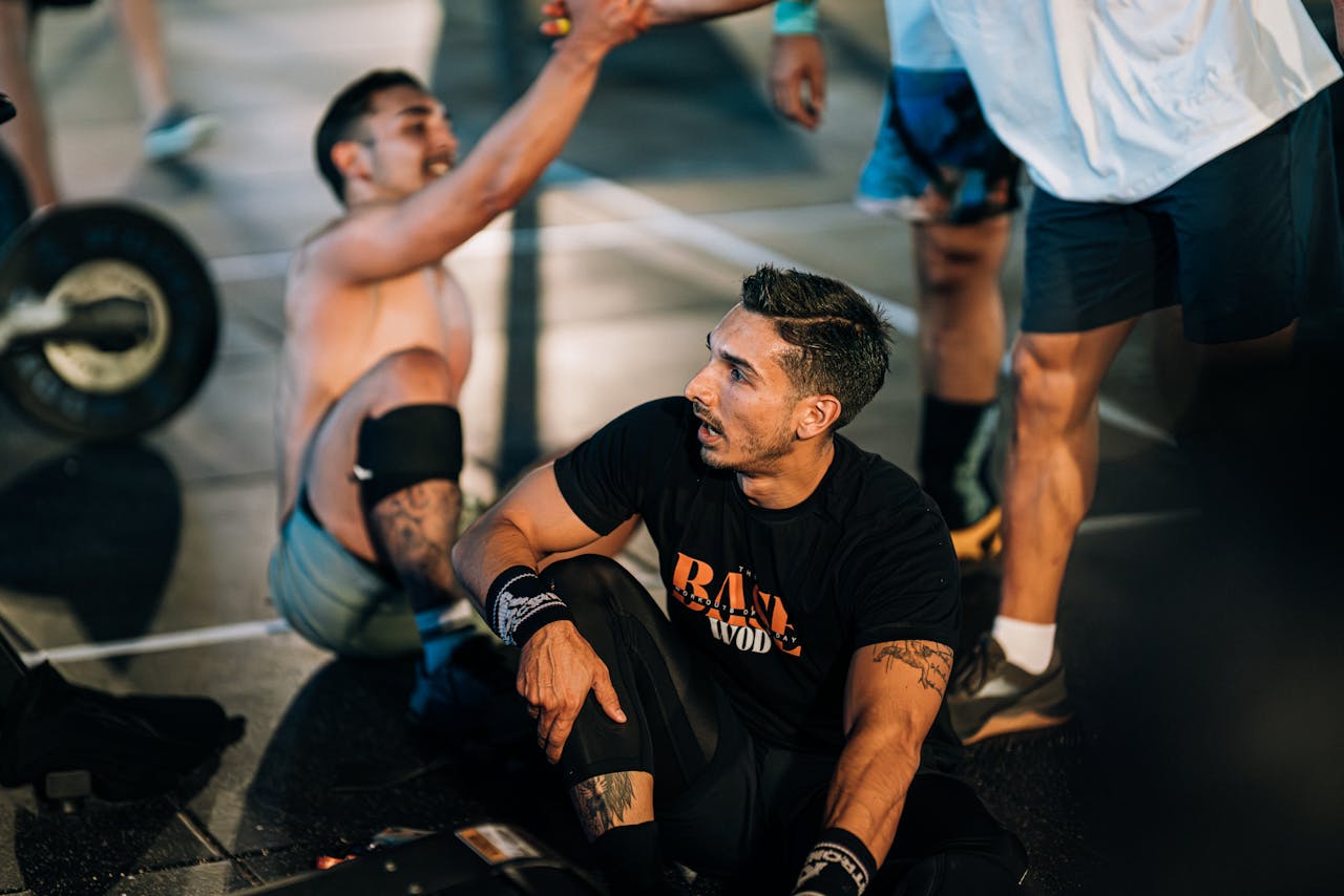 Athletes engaged in a high-energy CrossFit workout at a gym in Kuşadası, Türkiye.